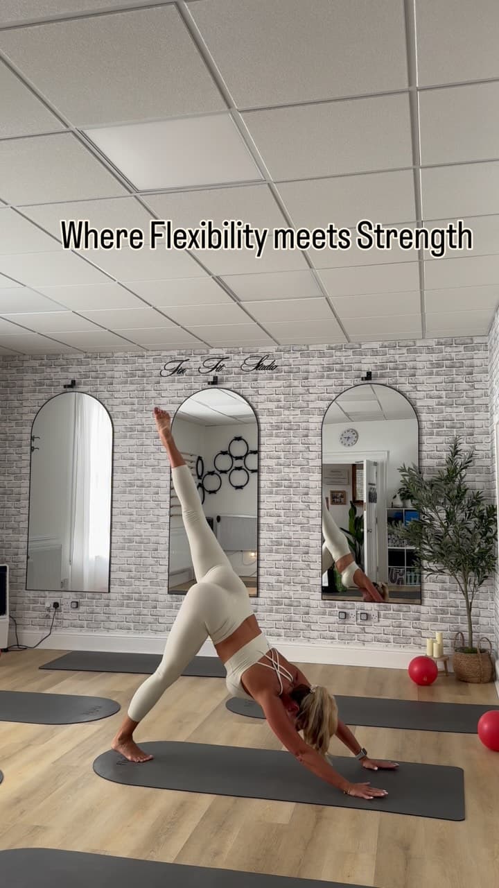 Three-legged downward dog in the FinFit studio